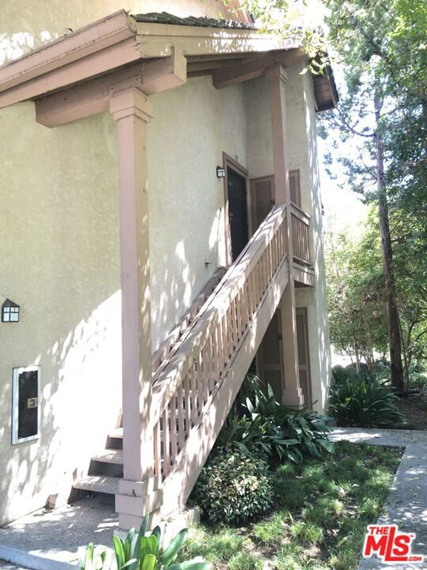 Welcome home to this top floor unit in the lush and beautiful Canoga Lakes community, an amazing and secure gated resort-like complex, Canoga Lakes is an oasis right in the heart of the city. This 1 bedroom 1 bath plus loft unit has brand  new carpeting and painting throughout.  Abundance of natural lighting. Unit comes equipped with stackable W/D hookup IN UNIT as well as central heat and air and a dishwasher.  Working from home? The massive bonus loft space is not included in the square footage count of the unit and makes the perfect at home office or additional living space, making this a one of a kind oversized one bedroom unit. Community amenities include: pool, spa, fitness center, tennis courts, sauna and one of course, one of the biggest highlights: lush grounds with several water features and an abundance of wild life. You will feel like you are miles away from the city and in paradise just taking a walk around the community. Relax by one of the many beautiful streams or tranquil waterfalls and you might even see a few ducks waddling about.  No shared walls with the bedroom. Water and trash are included. Don't miss out!