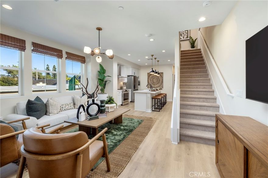 City Ventures' newest neighborhood in El Cajon. Solar included townhomes featuring all-electric stainless kitchen appliances and smart built-in technology. Lot 21 features 3 bedrooms, open kitchen with island. Photos are of model home and not actual home for sale.