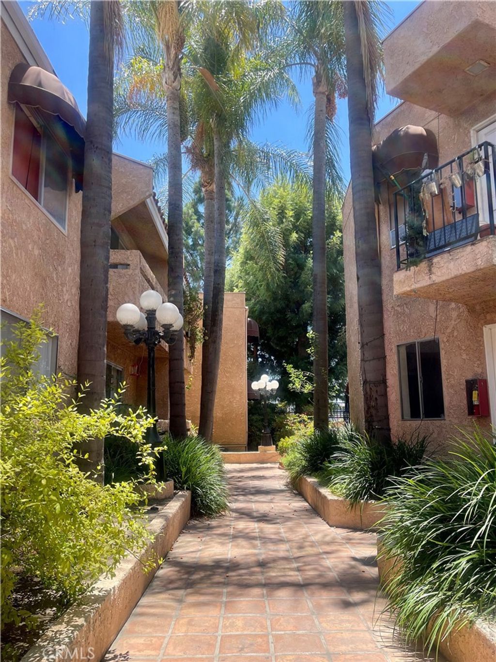 Photo of 8020 Langdon Avenue #208, Van Nuys, CA 91406 (MLS # SB25170626)