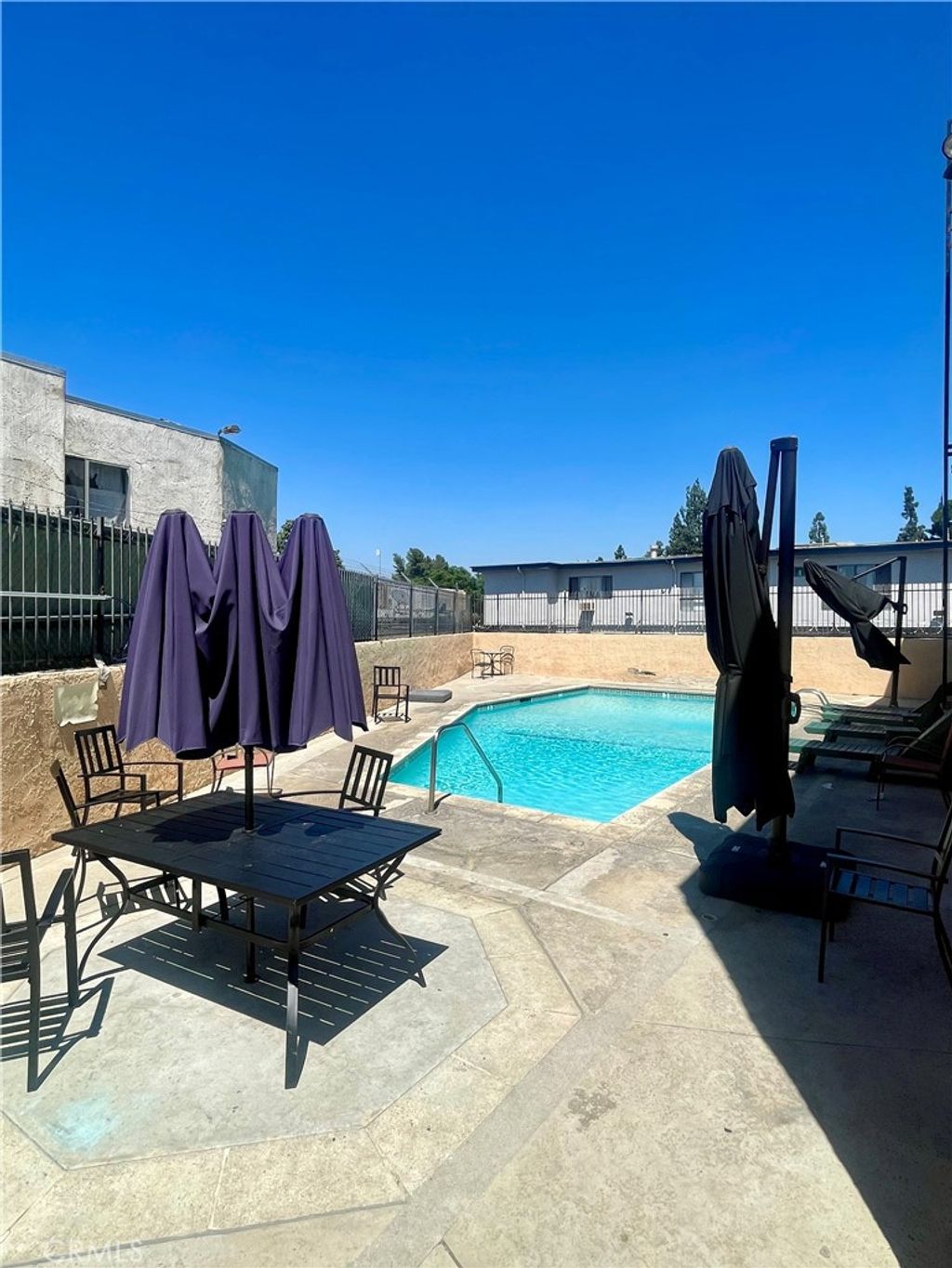 Photo of 8020 Langdon Avenue #208, Van Nuys, CA 91406 (MLS # SB25170626)