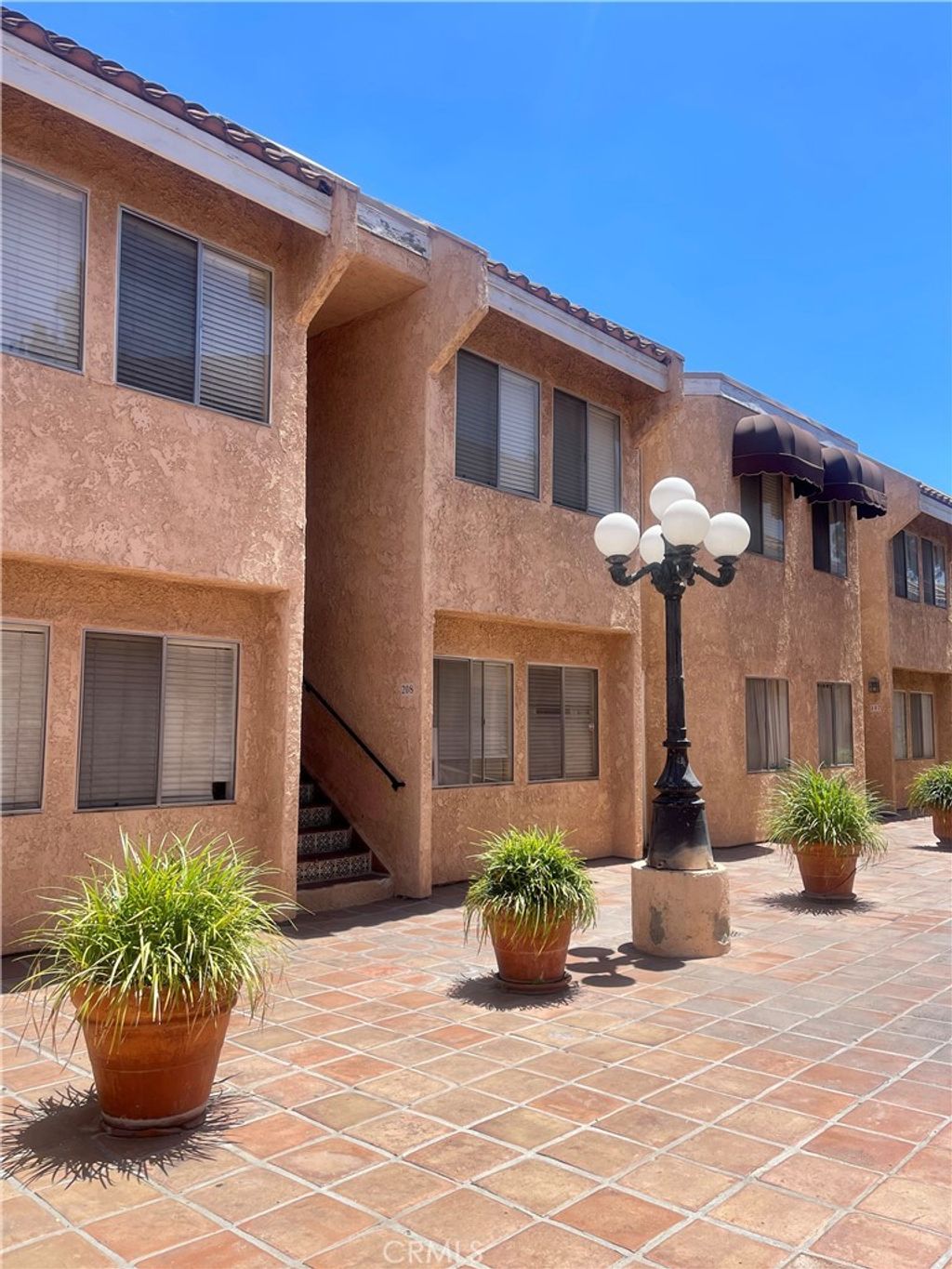 Photo of 8020 Langdon Avenue #208, Van Nuys, CA 91406 (MLS # SB25170626)
