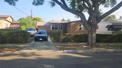 Photo of 901 E 102nd ST, Los Angeles, CA 90002 (MLS # PW26218300)