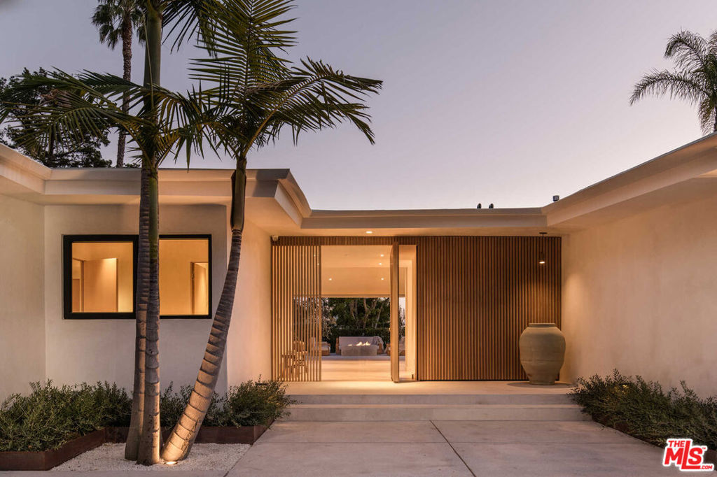 Located on one of the most desirable streets of the Hollywood Hills, 1718 Rising Glen is a house built with the finest attention to detail while honoring philosophies of minimalistic design. Inspired by some of the world's most iconic resorts, the home features clay ceilings and walls, Styline sliding glass doors, 12 inch white oak floors, limestone hardscape and exquisite travertine throughout. Fully equipped with Miele appliances, a Crestron home automation system and tranquil pool/spa, this home is one of the hills most thoughtful and inspired offerings.