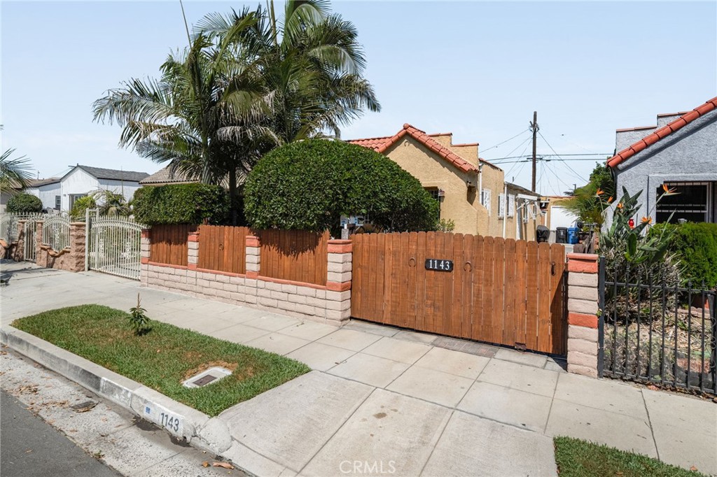 CHARMING SPANISH MEDITERANEAN HOME, NESTLED IN THE HEART OF SOUTH LOS ANGELELS! THIS DELIGHTFUL 2 BEDROOM, 1 BATH HOME BLENDS CLASSIC LOS ANGELES ARCHITECTUAL STYLE ALONG WITH LOTS OF COZY LIVING SPACE. THIS HOUSE COULD BE PERFECT FOR A FAMILY THAT NEEDS EXTRA SPACE! THE HOUSE INCLUDES 2 ADDITIONAL BONUS ROOMS (ONE WITH A SMALL KITCHENETTE). OPEN SPACE KITCHEN, REMODELED KITCHEN WITH NEWER WHITE KITCHEN CABINETS, GRANITE COUNTERTOPS, PORCELEAN TILED FLOORS, FRESHLY PAINTED AND OPEN ARCHWAYS. THE LIVING ROOM HAS BEEN FRESHLY PAINTED, SPARKLING HARDWOOD FLOORS, NEWER FRONT ENTRY DOOR AND A CUSTOM CEILING LIGHT FAN. THE BEDROOMS HAVE HARDWOOD FLOORS, FRESH PAINT AND CUSTOM CEILING LIGHT FANS. THE BATHROOMS CONSIST OF TILED AND LAMINATE FLOORS, PEDESTAL SINKS AND STEP IN TUBS. THE STACK WASHER AND DRYER ARE IN THE REAR BREEZWAY. THE FRONT ENTRY HAS A CUSTOM BLOCKWALL WITH A REDWOOD FENCE ENTRY, TILED ENTRY, SPANISH ROOF TILE, DOUBLE PANE WINDOWS, MANY NEW INTERIOR DOORS, EXTRA LONG DRIVEWAY WITH A LONG BRICK INLAY AND MANY KING PALMS THROUGHOUT. THE HOUSE IS WITHIN MINUTES TO BUDLONG AVE. ELEMENTARY, HARACE MANN MIDDLE SCHOOL AND AUGUSTUS HAWKIN HIGH SCHOOL. WITHIN MINUTES TO SOFI-STADIUM, INUIT DOME AND LAX.