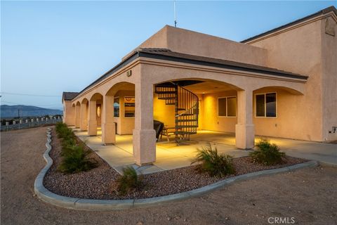 Photo of 23053 Roundup Way, Apple Valley, CA 92308 (MLS # HD25275524)