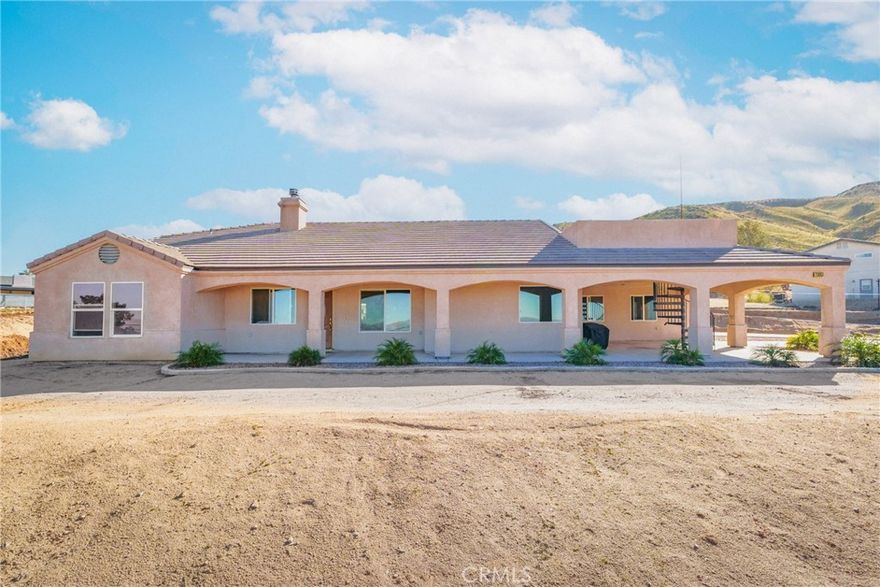 Come and see this entertainers delight with spectacular views of the city. Located in the desired Marianas, sits a Beautiful 3 bedroom 2 bathroom 2297sqft home on a 1.638 acre elevated lot. As you enter the home, you are greeted by an open concept floor plan. Walk passed the fireplace perfect for those cozy nights and enter into the kitchen. This kitchen has plenty of cabinet space and a walk in pantry. Neutral toned granite sits on top of the upgraded cabinets. The kitchen flows into your dining room perfect for a large dining room table. The spacious living room is located to the front of the home with amazing views of the city. This home has a split floor plan. The two large bedrooms are located on the east side of the home with the guest restroom. Located on the west side of the home is the primary bedroom. Walk through the large primary bedroom and you are greeted by the primary restroom. Double sinks, sunken tub and a glass shower and a walk in closet make up this stunning ensuite restroom. This home keeps giving with the indoor laundry and roof top deck. The three car detached garage is located to the rear of the home. This home has a new septic system that was installed two years ago and leased solar panels that will need to be assumed by the new buyer.