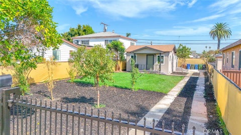 Photo of 1433 W 96th ST, Los Angeles, CA 90047 (MLS # DW26212093)