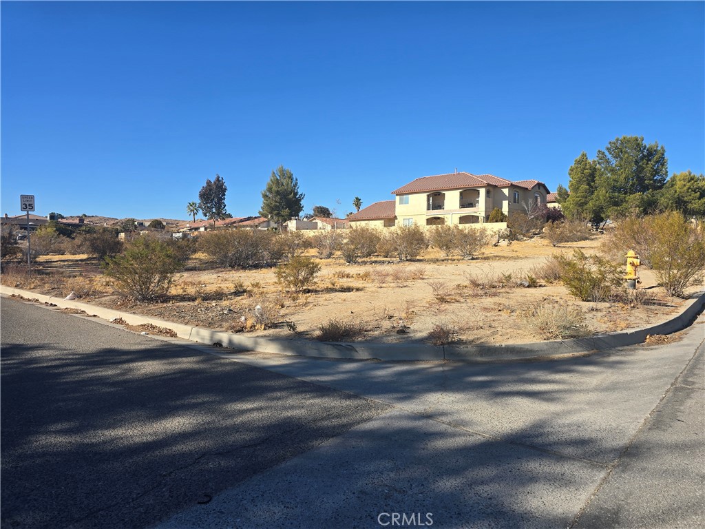 Land for Sale in Prime Location. Discover the endless possibilities of this prime piece of land. This property is a blank canvas awaiting your creative
vision. Just minutes from the freeway, making commuting a breeze. Close to a community college, shopping centers, restaurants, and the mall.
Future Growth: Exciting plans for a Brightline Bullet train station in the High Desert, enhancing connectivity and boosting local convenience. Don’t miss this rare opportunity to own a beautiful piece of land in a prime location, perfect for creating your dream project! Buyer to verify utility access and use of property.