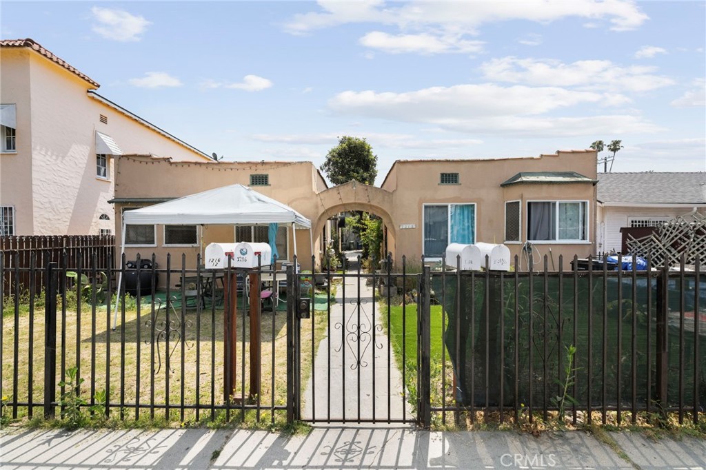 Investor’s Dream Opportunity! This 1923 Spanish Charmer is on title as a true quadruplex, featuring 4 individual 1-bedroom, 1-bathroom units—perfect for generating multiple streams of income. Situated on a 5,581 sq. ft. lot in an exclusive mid-city neighborhood, central to the West Side and just minutes from Mid-Town Crossing, this property offers strong rental potential. The expansive lot size provides room for added value down the road—whether through future improvements, expansion, or redevelopment. A rare chance to secure a historically charming investment property in a prime location!