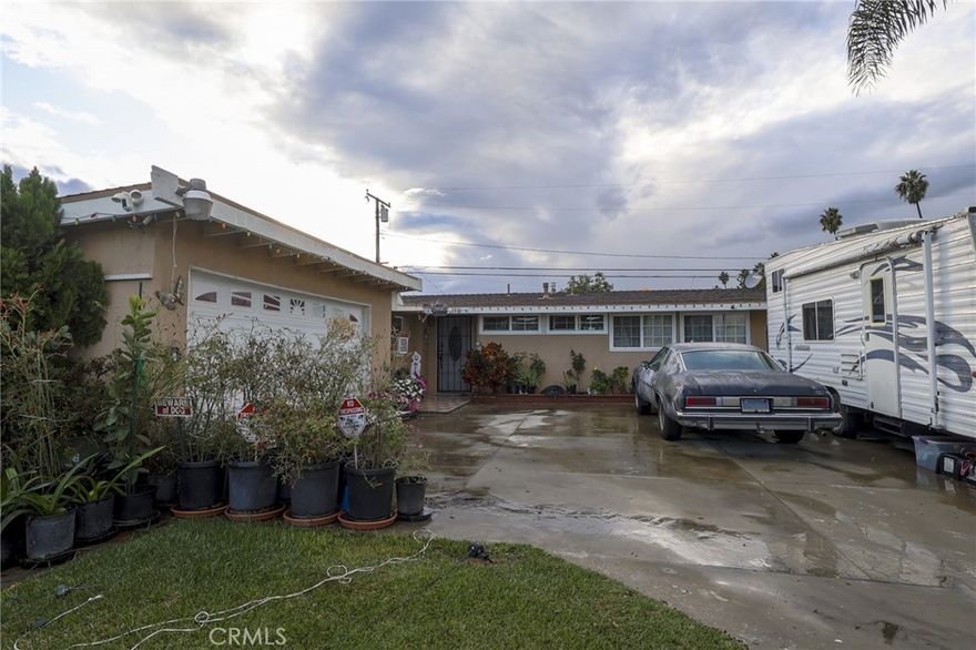 Welcome to 2310 S Olive St — a rare opportunity to own a spacious 3-bedroom, 2-bath home in a highly sought-after Santa Ana neighborhood. This property offers incredible potential for buyers looking to personalize a home and add long-term value. With a generous floor plan, multiple living areas, and a large lot, the layout provides a strong foundation for modern upgrades and creative renovation. The kitchen, dining area, and living room deliver excellent natural light and functional space ready to be transformed into a contemporary open-concept design. Each bedroom offers comfortable dimensions and can easily be refreshed to match current trends or your personal vision. The bathrooms provide a clean slate for stylish updates and new finishes. Outside, the expansive covered patio, driveway, and yard create the perfect opportunity for outdoor living enhancements, gardening, or future improvements. This home is not in turnkey condition, but with a little tender love and care, it can become a standout property with significant upside. Investors, first-time homeowners, and families seeking a customizable space will appreciate its strong bones and flexible layout. Located near schools, parks, shopping, and major freeways, the location offers everyday convenience and excellent commuter access. Whether you’re looking to renovate, modernize, or simply add your personal touches over time, this property is a promising canvas with endless potential.
Bring your vision, creativity, and imagination — Ready to become the home you’ve always wanted.