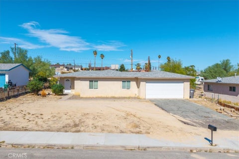 Photo of 73204 Sun Valley Drive, 29 Palms, CA 92277 (MLS # JT26222066)