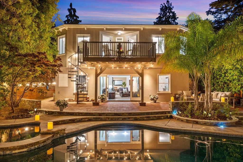 Tucked along tree-lined Montero Avenue in Burlingames coveted Easton Addition, this beautifully updated and expanded home blends warmth, design, and function. With over 3,000 sq ft, 4 bedrooms, and 3.5 baths, it offers thoughtfully curated spaces for modern living. The heart of the home was reimagined in 2019 with an open flow between the kitchen, dining, and family rooms, all connected by white oak engineered hardwood floors. The kitchen invites connection, from holiday breakfasts to late-night chats, while the open layout keeps everyone engaged. Downstairs, doors open to a private backyard retreat with a PebbleTec pool, spa, and new equipment (2021). A solar heating system by Poco Solar keeps the pool warm into the fall. The lower-level suite with radiant heat and surround sound offers flexibility as a guest or au pair space. Additional highlights: Tesla fast charger, CAT 5 wiring, new gutters (2024), and custom period-inspired banisters. Moments from top schools, parks, and Burlingames vibrant shops and dining, this home is more than a place to liveits a lifestyle.