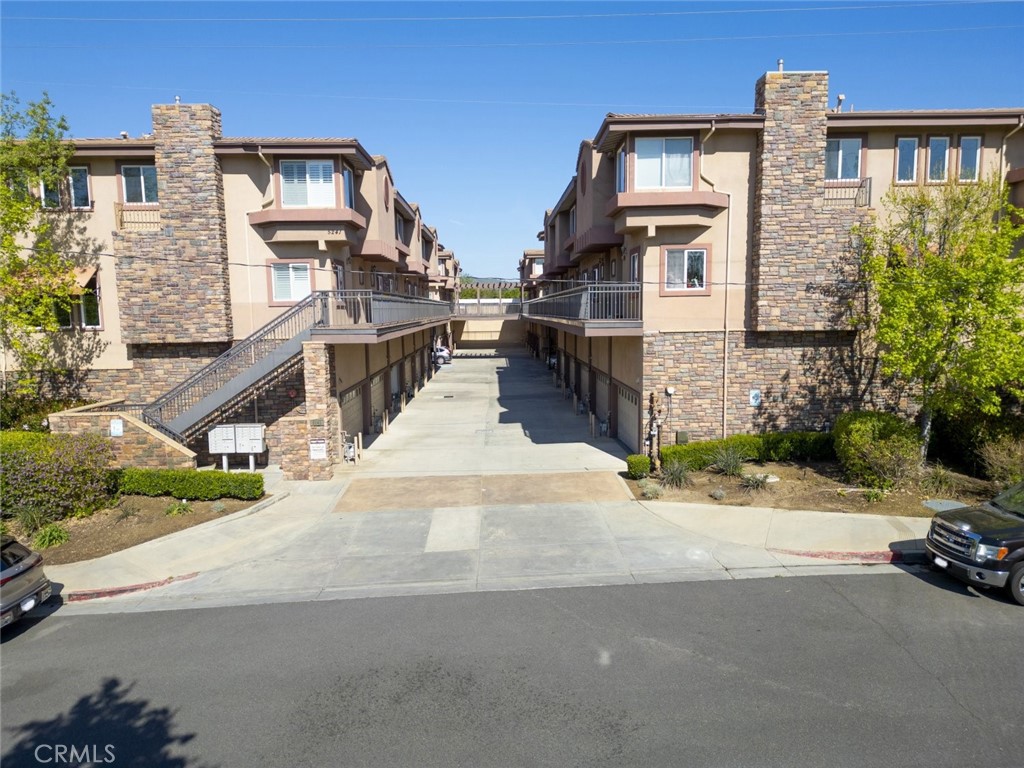 NEW PAINT AND NEW FLOORING! Welcome to this beautifully maintained townhome nestled in the heart of Agoura Hills, Offering the perfect blend of comfort space and convenience this 3 bedroom 2.5 bathroom residence spans 1800 square feet of thoughtfully designed living space The interior features a warm and inviting atmosphere with a full kitchen that includes ample cabinetry and counter space ideal for both everyday cooking and hosting gatherings. The spacious dining area connects seamlessly to a cozy living room anchored by a charming fireplace creating the perfect setting for relaxing or entertaining guests. Upstairs you will find generously sized bedrooms including a serene retreat primary bedroom with a walk in closet and en suite bathroom. All the bathrooms are tastefully appointed offering a balance of style and functionality. The layout provides a harmonious mix of open communal areas and quiet personal spaces making it well suited for a variety of lifestyles. Additional highlights include an attached garage for easy parking and access to a sparkling community pool perfect for enjoying sunny Southern California days. Situated in a desirable neighborhood this home is minutes from parks shopping dining and award winning schools with convenient freeway access for commuters. Call this beautiful home yours today!