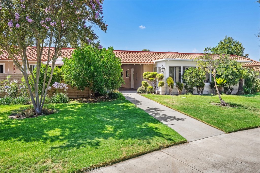 Stunning Completely Remodeled "CASA VISTA" Home!
Welcome to this luxurious, move-in-ready home, meticulously remodeled from the studs up to seamlessly blend modern comforts with sophisticated design. Additionally, this property has been repiped, including both electrical and plumbing systems. From the moment you step inside, you'll be greeted by an abundance of natural light and a breathtaking media/fireplace wall that creates an inviting and serene ambiance. The skylights in the living room and two bedrooms are amazing, as they enhance the space. Very well thought out. The gourmet kitchen is a chef's dream, featuring a waterfall-style island with quartz countertops and top-of-the-line appliances. Additional highlights include built-in storage, central heating and air conditioning, a stackable washer and dryer in the hall closet, an enclosed patio off the living room, and an additional patio accessible from the guest bedroom. This beautifully remodeled master suite offers a luxurious retreat, complete with an en-suite bathroom featuring a large, elegant shower. Enjoy the convenience of a spacious walk-in closet and the warmth of beautiful laminate wood floors. This serene space is perfect for relaxation and comfort. Along with all the excellent features of this stunning remodel, there is no one above or below you, and easy access to parking. This home offers ultimate convenience and privacy. An additional feature is a large walk-in closet upon entering. Embrace an unparalleled lifestyle with a 27-hole championship golf course, 9-hole executive par three courses, tennis courts, paddle tennis, pickleball, lawn bowling, two fitness centers, seven clubhouses, five swimming pools, an equestrian center, extensive gardening opportunities, an art studio, and a world-class woodshop. Join over 200 clubs and organizations—there truly is something for everyone! With free bus transportation throughout the community, nearby shopping, and economical RV storage, country club living couldn't be easier or more enjoyable—all this, and just approximately 6 miles from the pristine shores of beautiful Laguna Beach. Discover the best-kept secret in Orange County. Your dream lifestyle awaits—do not miss this rare opportunity! "SEE 3D TOUR"