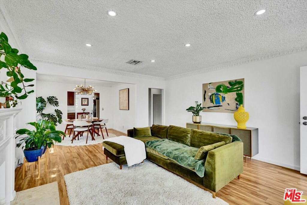 Photo of 8719 Cimarron Street, Los Angeles, CA 90047 (MLS # 26678771)