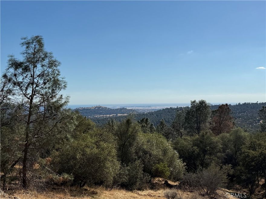 Find Peace, Serenity, and a Sky Full of Stars inside the Gated and Prestigious Flying O Ranch Community in Coarsegold/O'Neals. This 39.12 +/acres of land sits at the end of a cul-de-sac, is at one of the highest elevations of the Ranch, already comes with a Shared Well, and is a perfect place to Explore, Relax, Escape from the city, and have space from neighbors!



Design your Dream Home on this Amazing Blank Canvas of Possibilities. The property features a Shared Well, a PG&E Power Pole not too far away, Mountain and Valley Views, Sunsets, Wildflowers, Oak Trees, Bull Pines, and Manzanita Trees, not to mention Beautiful Mossy Granite Rock Outcroppings, and 2 sides of the parcel already has barbed wire fencing!



This Community is located in the Sierra Foothills, and has a total of (34) 40 +/- acre parcels that were developed for mixed agricultural and residential use. The Association offers owners exclusive rights to enjoy the hiking trails, horse trails, clubhouse, community pond, training arena, round pen, tack room, and boarding stables all within the gated 1,400 +/- Acre of Flying O Ranch. Ammenities also include trash service, road maintenance, and a ranch caretaker all for $385 per Quarter.



Short-Term Rentals are not allowed inside this community, and up to two residences can be built on any parcel. The property is also part of the Williamson Act (a Tax incentive for property owners), and cannot be subdivided into more parcels.



It's a short drive to Highway 41 and Chukchansi Gold Casino for dining and entertainment, as well as Madera & Fresno for those commuters. Bass Lake and Yosemite National Park are also a quick drive away for fun and adventures! Schedule a showing today!!