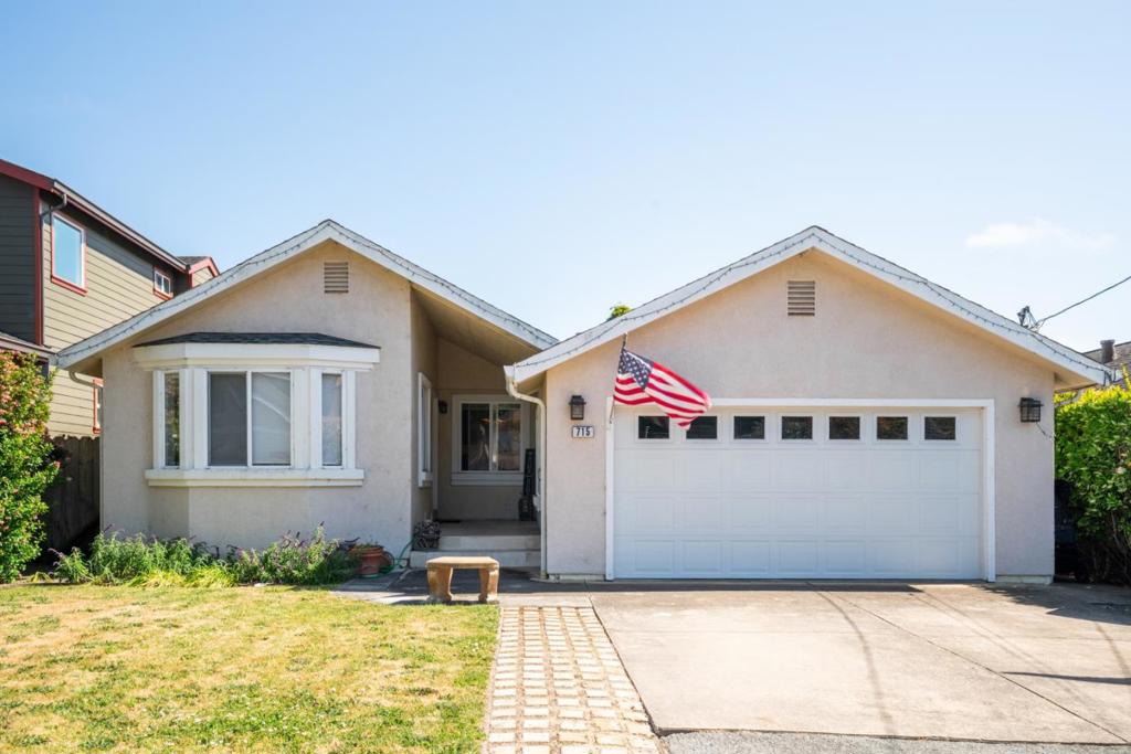 Coastal Ease Meets Everyday Elegance. Set in the sought-after coastal enclave of El Granada, just blocks from Princeton Harbor, this beautifully updated single-level home offers an exceptional blend of comfort, space, and seaside charm. Behind its graceful stucco facade, 715 Sonora Avenue welcomes with vaulted ceilings, light-filled interiors, and a layout designed for effortless living. The open-concept kitchen flows seamlessly into the family room, while a separate living room and dining area provide flexibility for both relaxed evenings and refined entertaining. Renovated in 2018, the home features modern finishes, new window coverings throughout, and timeless details that elevate the everyday. Three spacious bedrooms invite rest and retreat - two with direct access to private decks that open into the expansive backyard. This outdoor sanctuary includes a mature landscaping, fire pit, patio, generous space for gatherings under the stars. An oversized two-car garage with built-in storage ensures convenience is always within reach. Here, mornings begin with harbor breezes, weekends unfold along scenic walking paths, and the ocean is never far. Just 25 miles from SF, this resort-like setting offers a rare lifestyle where coastal calm meets everyday connection.