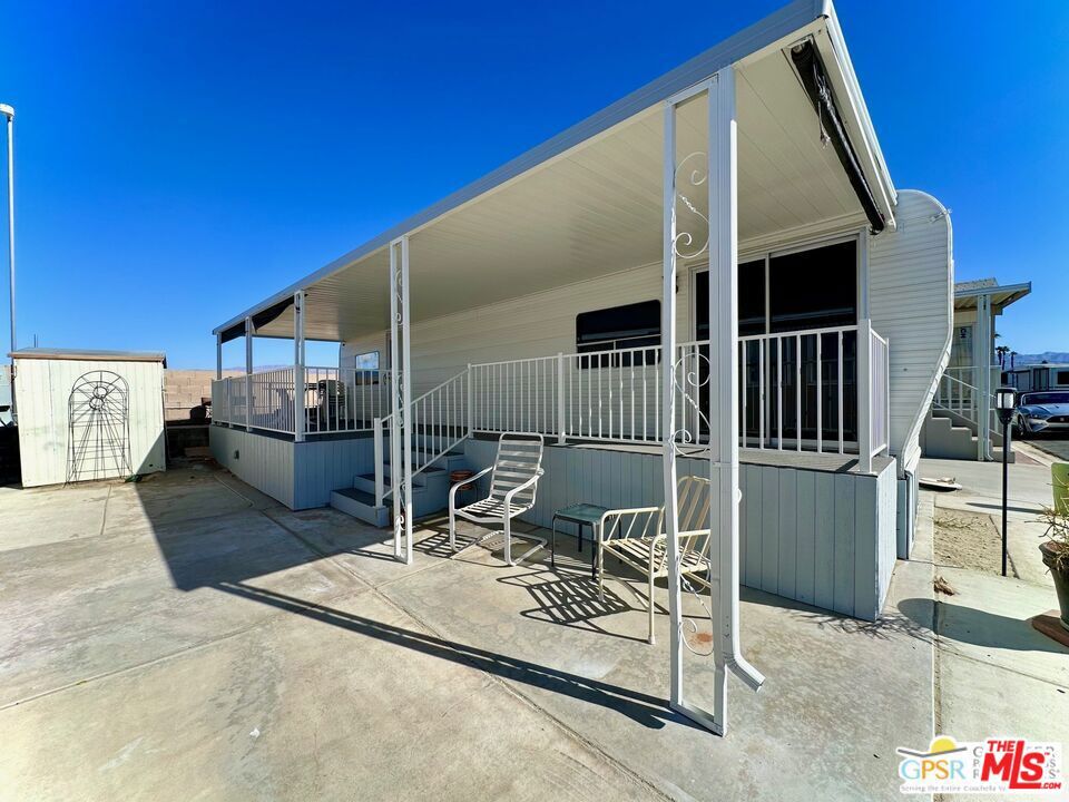 OWNER FINANCING AVAILABLE...CALL FOR TERMS. Experience vibrant 55+ living in this newly renovated park model located in the Indio Springs RV Resort, right in the heart of Coachella Valley. Formerly known as the Happy Wanderer RV Resort, this pet-free seasonal community offers a wealth of amenities, including pickleball and tennis courts, two year-round pools, a spa, card room, library, and a putting green. A quick stroll from Fantasy Springs Casino Resort and just a short drive from Palm Springs and nearby desert cities, this resort provides a prime location with stunning mountain views. This RV model features a newly installed energy-efficient air conditioning and heating system, a spacious covered deck, a utility shed, and both front and rear entry doors. The interior offers an open-concept living space with a roomy living room and bedroom, and a walk-through full bath connecting the main areas. The RV is fully furnished, turnkey, and includes cable and internet through the HOA, making it an ideal move-in-ready retreat. Seller financing available call for terms. Enjoy resort-style living and walkable access to the casino and its dining options the perfect blend of comfort and convenience awaits you.
