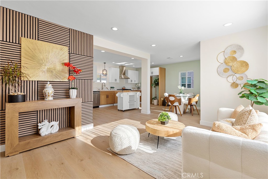 This incredible and beautiful single story home offers modern comfort and timeless charm in one of Lakewood’s most desirable neighborhoods! Inside, you’ll find an inviting open concept living space with luxury waterproof vinyl floors, recessed lightings, fresh paint and a cozy fireplace. Both bathrooms have been stylishly upgraded with custom slab shower walls, Bluetooth speakers, LED mirrors and designer’s vanities. Kitchen has been upgraded with new design shaker cabinets and exotic quartz countertops, not to mention the waterfall feature and new stainless steel kitchen appliances.
Don’t forget the new custom iron gate, brand new central air conditioning unit, new garage door and opener, and new front yard landscape and sprinklers.
4th bedroom with a closet is permitted and can be used as a family room or bedroom. Also possible separate unit ( Junior ADU ) for possible income. Spacious backyard with potential for ADU or outdoor entertaining. Laundry area in the garage with plenty of room for a Hobby Room or Great Workshop.
Conveniently located near parks, schools, shopping, and freeway access, this move-in-ready home is perfect for families, first-time buyers, or investors.
This gem is ready for you to move in and enjoy!
This home also grants admittance to the exclusive Lakewood Gardens Civic Association which includes swimming pool access, clubhouse and more! (Membership is optional)