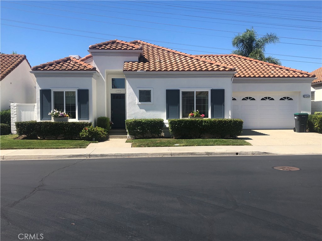 Come and see this charming single-story home located in the highly desirable Palmia senior 55+ community! This unit offers a unique location with more privacy as there is no one behind the property and the back patio looks out onto a big, beautiful greenbelt. It has newer windows and an open floor plan. The master bedroom offers entry to the patio through beautiful sliding doors and also has a large bathroom with double sinks. The garage has everything you need, with lots of storage cabinets, shelving and 2 large ceiling racks. A versatile den compliments the large living room, and you can choose to eat in the formal dining area or the cute kitchen nook! This home is a short, easy walk to the beautiful clubhouse and pool where you can also enjoy many amenities such as tennis courts, golf course, pickleball, bocce ball, shuffleboard, a grand ballroom, billiard room, exercise room and lots of fun activities! The community is gated with a security guard and controlled access. HOA dues include internet and ownership also comes with Lake Mission Viejo membership. This gem is perfectly nestled in one of the most sought-after neighborhoods, close to all kinds of shopping and restaurants, and is perfect for peaceful and quiet living in a premium adult community.