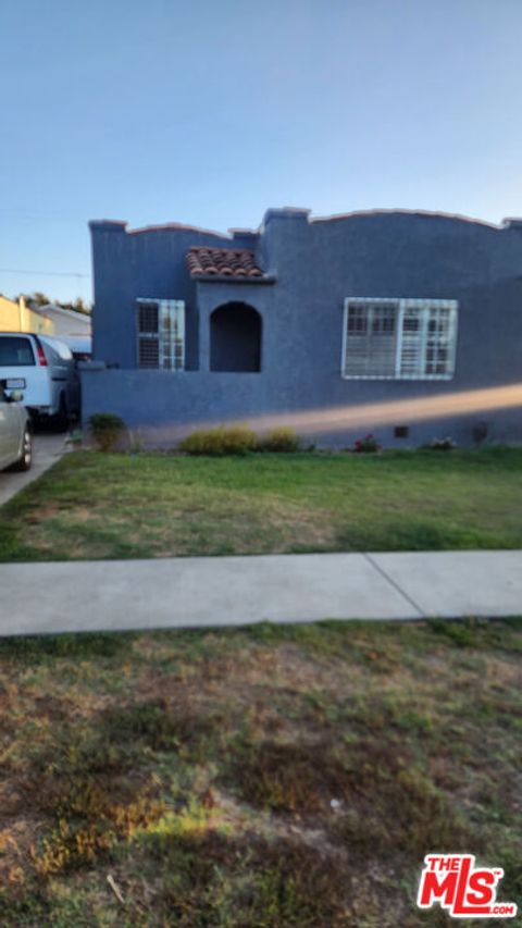 Photo of 742 E 84th Place, Los Angeles, CA 90001 (MLS # 25628899)