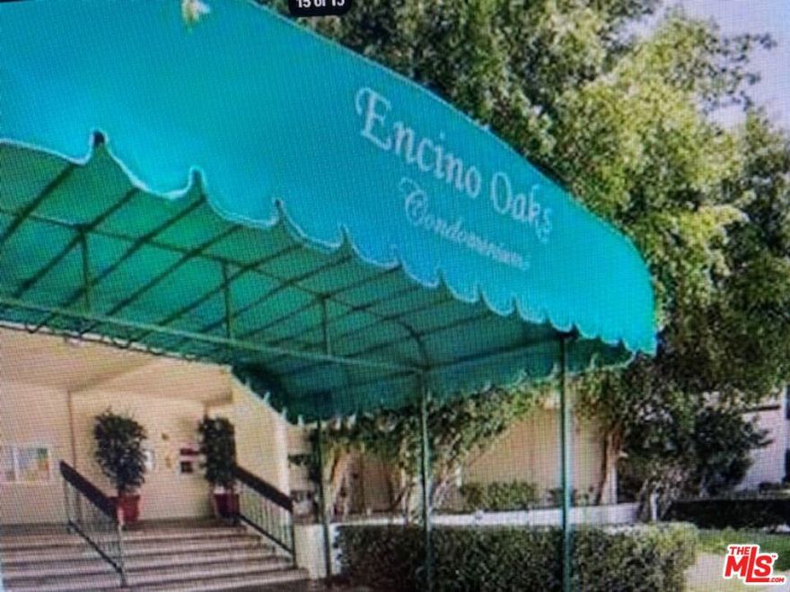 Encino Oaks community is Ideally situated just steps from Ventura Boulevard, with quick access to the 101 and 405 freeways, this home offers both comfort and convenience. The first floor features a spacious living room with a private balcony, guest bathroom, kitchen, and ample closet space. Upstairs, you'll find a loft-style bedroom with a full bath and generous closet. The kitchen includes attractive countertops, abundant cabinetry, and tile flooring, while the living area is enhanced with wood laminate floors. Additional highlights include two side by side parking spaces. Water and trash are included in rent, and pets are welcome. Community amenities include a sparkling pool and spa, tennis courts, fitness center, sauna, recreation and game rooms, community laundry facilities, and secured underground parking. Easy to show.