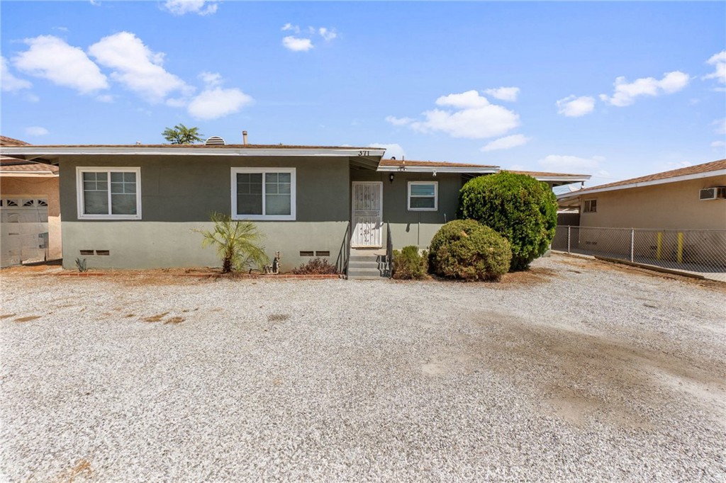 EXCEPTIONAL VALUE IN COLTON! Welcome home to incredible value and endless possibilities at this charming 3-bedroom, 1.5-bathroom single-family home that delivers everything first-time buyers and growing families dream of space, comfort, and affordability in the heart of Colton. This move-in ready 996 sq ft home features fresh interior and exterior paint completed within the last 5 years, with a thoughtful layout that maximizes every square foot for comfortable living and entertaining. The real treasure is your private 8,698 sq ft lot an entertainer's paradise and blank canvas for your vision where you can host memorable BBQs, create the ultimate play area for kids, start that garden you've always wanted, or simply enjoy the rare luxury of space in today's market. Add an ADU, expand your home, or create multiple outdoor living zones the possibilities are endless on this generous lot! This home offers authentic character with its charming exterior chimney adding classic architectural appeal, one-car garage plus additional driveway and front yard parking, three genuine bedrooms with no converted spaces, 1.5 bathrooms providing convenience for busy families, all situated in an established neighborhood with mature trees and character. Located in a quiet residential area with easy access to Colton High School, this property is perfect for families prioritizing education and community while enjoying small town charm and staying connected to Greater San Bernardino County amenities, shopping, and employment centers. In today's competitive market, finding three bedrooms, substantial lot size, and move-in condition under $450,000 is rare this property offers first-time buyers the opportunity to build equity immediately while enjoying the space and lifestyle typically reserved for much higher price points. Perfect for first-time homebuyers, growing families, investors, or anyone seeking maximum value and future potential. Don't let this exceptional opportunity pass you by homes with this much space and value don't last long in today's market!