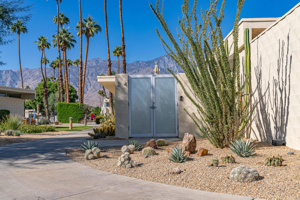 STUNNING VIEWS at the Seven Lakes Golf and Country Club in South Palm Springs await you! This renovated 2 bedroom / 2 bath home features 1,545 sq ft of living space and is positioned along a quiet setting, on the 9th TEE of the Ted Robinson-designed golf course. From the courtyard, favor expansive mountain views from all directions, as well as, the Bob Hope estate. You will also enjoy lakeside and fountain views from the living room. This home has been professionally renovated with ceramic tile flooring throughout. The remodeled kitchen boasts walnut cabinetry, quartz counters, stainless steel appliances. Adjacent to the kitchen, there is a wine cooler for all your entertaining needs. The thoughtfully designed bathrooms are lined with fresh white tile, mosaic accents, along with new cabinetry, sinks and faucets, etc. Newly installed double-panel sliding doors throughout keep the inside temperatures comfortable during summer months. Electric shades and blackout shades in the bedrooms, make it even easier to stay cool in the desert. Known as ''The Gem of the Desert,'' Seven Lakes is a 24/7 guard gated community. Unwind at one of the nearby 15 community pools/spas.