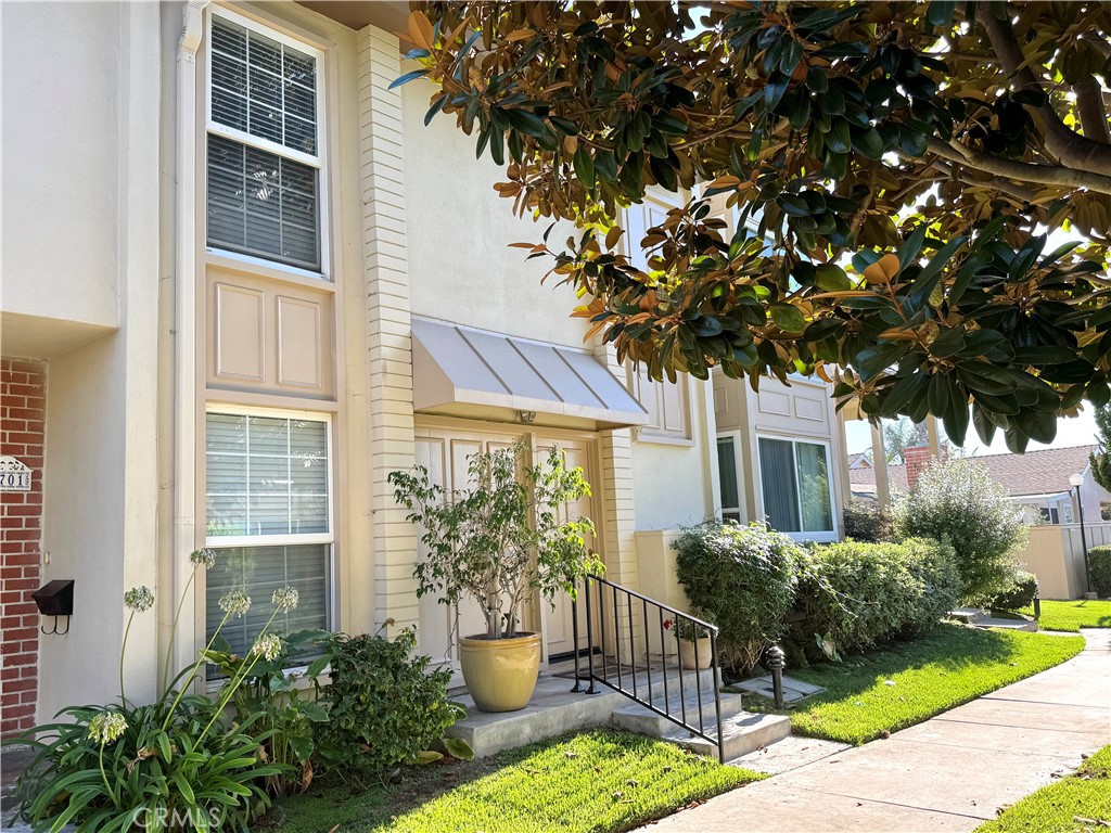 Stop Your Search! You’ve Found It! Just a very short drive from the sandy shores of the Pacific Ocean, this charming two-story townhome located on a greenbelt features a two-car garage and a sun-drenched patio adorned with lush plants, including a delightful fruit tree. Enjoy plush carpeting, a wet bar, and dual-pane windows/doors that invite the refreshing ocean breeze, complemented by a warm fireplace for added ambiance. The kitchen is equipped with ample cabinet space, practical countertops, a range oven, and a dishwasher for quick clean-up. With two bedrooms and a flexible den on the first floor that can function as a third bedroom, conveniently located next to a bathroom, this layout is highly sought after (also the staircase is up against the wall and not in the middle of the living room). Upstairs, the bedrooms provide plenty of space, each with its own bathroom. The primary suite flaunts a walk-in closet and an additional vanity area. Vacation at home in this relaxing Villa Pacific Community which offers swimming pools, a sports court, play yard, clubhouse, and RV parking for your adventurous side! Along with enjoying all these fantastic amenities, the prime location of this lovely townhome allows you to walk, bike, or take a quick car ride to dip into the Pacific Ocean, soak up the sun on the beach, or to simply marvel at a stunning evening sunset.