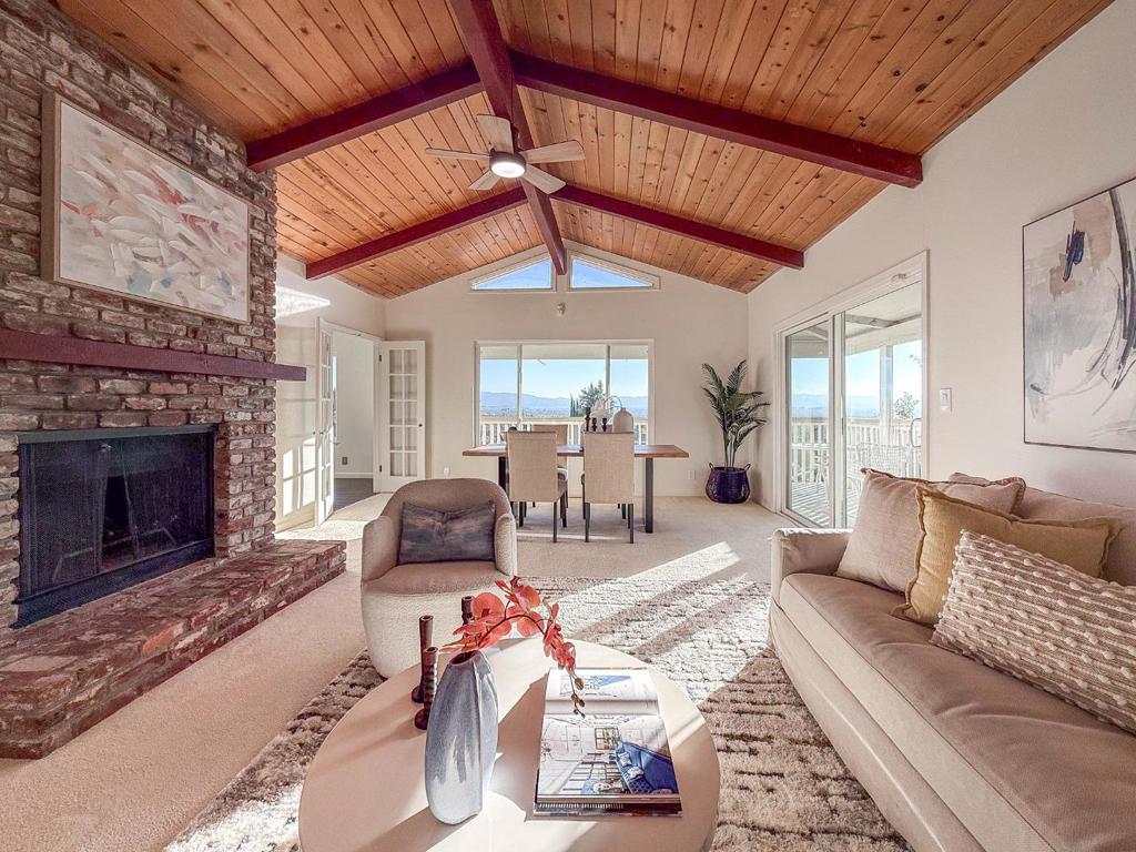 Spectacular Valley Views!! You can see all the way to San Francisco from here!! The spacious 4 bedrooms and 2.5 baths home is wrapped around by 2 decks and filled with natural light. Open concept kitchen offers generous counter space, modern appliances, and ample storage, Living room with vaulted ceilings flow seamlessly to the deck perfect for scenic view and entertaining. Master bedroom is on the main level. Large bedrooms downstairs with their own deck to take in the views. An oversized 2-car garage with tons of storage AND room for RV parking on the beautiful paver driveway plus more extra parking. A rare opportunity to enjoy privacy, country feel, comfort, versatility, and views in a peaceful neighborhood just minutes to main commute paths and shopping plazas. This home is a must-see!