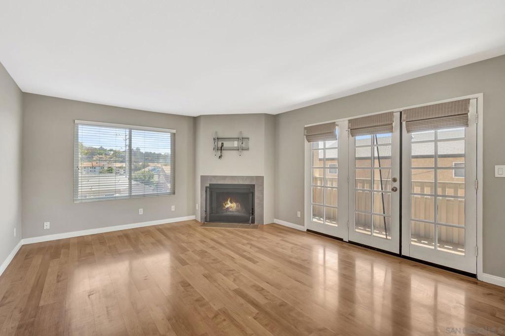 Super cute and move-in ready! This bright and airy 2 bed, 2 bath condo features a spacious open layout filled with natural light, a cozy fireplace, and a private west facing balcony perfect for relaxing, taking in the ocean breeze and watching beautiful San Diego sunsets or Sea World fireworks. Enjoy the convenience of your own full-size laundry closet and garage for parking and storage. This small complex features a pool and hot tub and is very well maintained. Ideally located near USD with easy access to freeways, shopping, dining, and the nearby trolley stop. A charming home in a prime location—don’t miss this opportunity!
