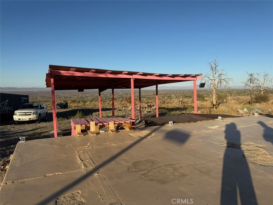 Bring your offers to the table.  Motivated Seller!  Approximately 20 acres of land, previously home to a permitted 806 sq. ft. residence that stood 24 ft high. The property was affected by the June 2021 Pine Fire. However, the foundation (34 ft x 37 ft) and a 4-ft-wide sidewalk remain intact.

The property still has a septic system on-site, though the water tank was removed. The seller believes the property is grandfathered-in for rebuilding, but buyers are advised to verify all information and conduct their own investigations and inspections.

Property markers are present. This site offers a unique opportunity to rebuild and design your future home in a peaceful, scenic setting. the property has solar lights installed . The seller is leaving the two containers, a tractor.