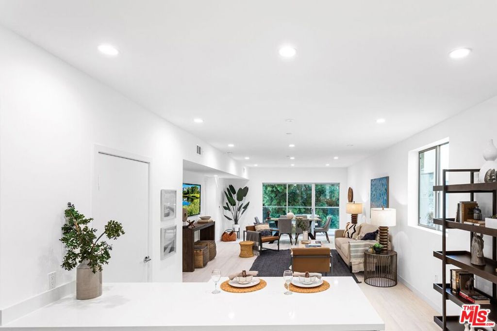 11620 Chenault Street, a New complex by Nayssan Properties, completed in 2023 in Brentwood North of San Vicente! The absolute best location in Brentwood at the end of a Cul de sac creating a private and peaceful environment yet walking distance to all Brentwood has to offer. Live in this bold and unique contemporary building with a beautiful and modern LARGE 3 bedroom VERY QUIET REAR apartment in an amazing location. VERY SPECIAL APARTMENT AND LOCATION WITH MATURE LANDSCAPING AND TREES ALL AROUND. UNIT 103 HAS ITS OWN HUGE PRIVATE PATIO! ONE OF THE BIGGEST IN BRENTWOOD! Perfect for gatherings, kids, pets, etc. Spacious apartment with open floor plan with high ceilings. Large bedrooms with plenty of closet space! Stainless steel appliances, luxury finishes, custom tile and marble, and in unit washer/dryer! Two parking spaces per unit. Walking distance to famous San Vicente Blvd. where you can enjoy the great restaurants, bars, nightlife, Whole foods, Farmers Market, etc. Walking distance to Barrington Park. Huge furnished roof top deck where tenants can relax during the day, enjoy the sunset with unobstructed 360 degree views of the City, Mountains, and Pacific Ocean. SEE REMARKS FOR SHOWING INSTRUCTIONS.