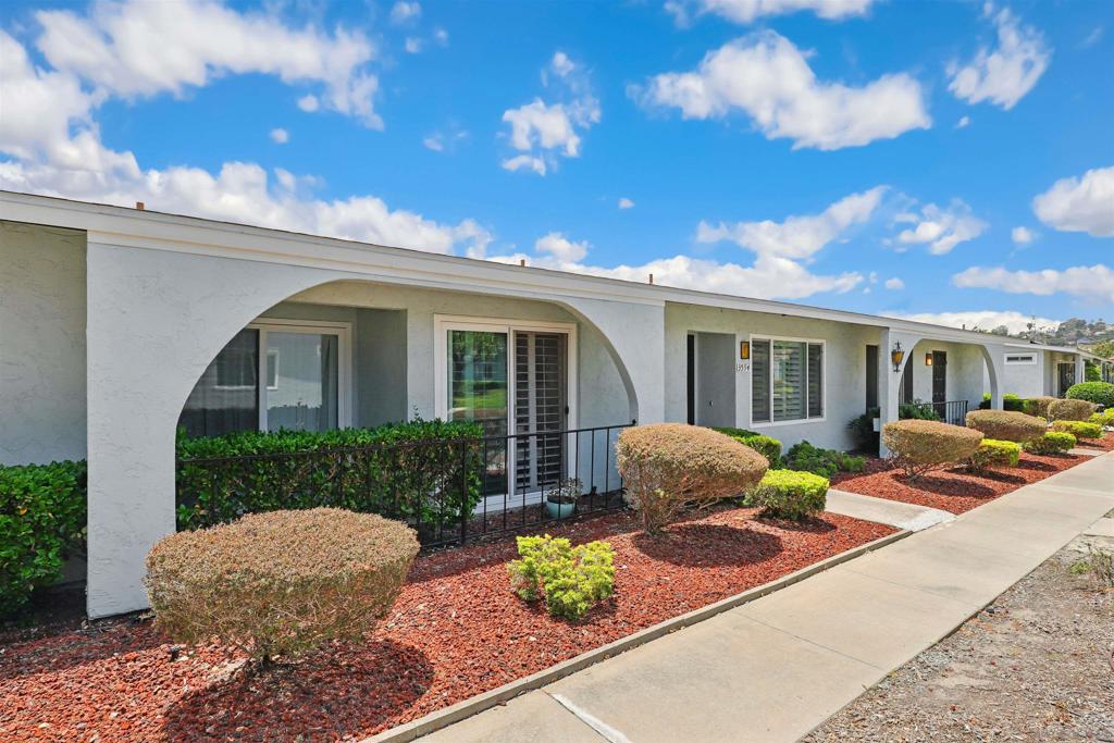 Welcome to this beautifully updated home in the highly desirable 55+ community of Oceana I, where comfort and convenience come together in style. Enter to discover laminate flooring throughout, including in the closets, offering a clean, cohesive look with easy maintenance. The remodeled kitchen is a chef’s delight, featuring newer cabinets with pull-out shelves, granite countertops, and new appliances—perfect for preparing meals and entertaining guests. Both bathrooms have been tastefully upgraded with custom ceramic tile work and updated cabinetry. Additional highlights include newer double-pane windows with shutters, a newer water heater, and a garage door opener for added peace of mind. Enjoy the serene lifestyle Oceana I offers, with community amenities. Don’t miss the opportunity to call this turnkey property your next home!