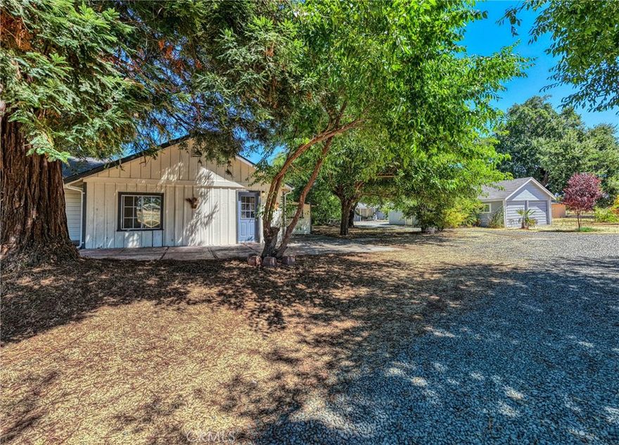 7.29-acre ranch with 3 Units! This is a unique opportunity for multi-generational living and agricultural pursuits. This property boasts rich soils, ideal for agriculture, and offers breathtaking views of Mt. Konocti and a mature walnut orchard. It features three distinct residential units, a detached garage, and an agricultural building, making it perfect for communal living arrangements. Adding to its charm, a magnificent old-growth oak tree provides ample shade and a sense of serenity. The seller has also thoughtfully planted a variety of fruit trees, enhancing the property's appeal. Unit #1 Is the main house A spacious 2-bedroom, 1-bathroom home.and it has been remodeled with new roof, windows, doors, interior and exterior paint, new appliances, laminate flooring flows throughout. There is a large mud room that offers washer dryer hookups. Unit #2 Is a comfortable 1-bedroom, 1-bathroom residence that has new paint inside and out. Unit #3 Is 1 bedroom, 1 bathroom, This unit has been tastefully modernized with exposed wood beam ceilings, a newer kitchen with stainless steel appliances, and charming barn doors, making it a truly turn-key home. The property is fully fenced with a private estate gate entrance, ensuring privacy.  Water is reliably supplied by Finley Water, and there's also a private, high-producing well that, according to the seller, provides ample water. Furthermore, the property borders Adobe Creek, offering a peaceful ambiance where you can relax, enjoy the views of Mt. Konocti, and listen to the seasonal flowing creek. This property offers immense potential and a multitude of opportunities.