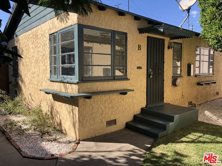 BEST PRICED SINGLE FAMILY COTTAGE  with Major renovation...an architectural chalet!  PRIVATE WASHER/DRYER, dishwasher, microwave, stainless appliances. Large Outdoor privately fenced patio deck and yard! New bricks and wood decking!  Great for private entertaining! Renovated gourmet kitchen with new counters and cabinetry,refinished hardwood floors, restored wood windows.  1-car parking plus Optional garage for $200 per month.  Tree top views. This  unique private cottage with charm galore for your most discriminating, creative clients who crave quiet and privacy!  Available November 30th.  Great environment for pets and entertaining.  This is a large one bedroom unit unlike any other house on the market and only one mile from the beach.  Easy access to freeways, Santa Monica College, UCLA!  Santa Monica living at its best!!