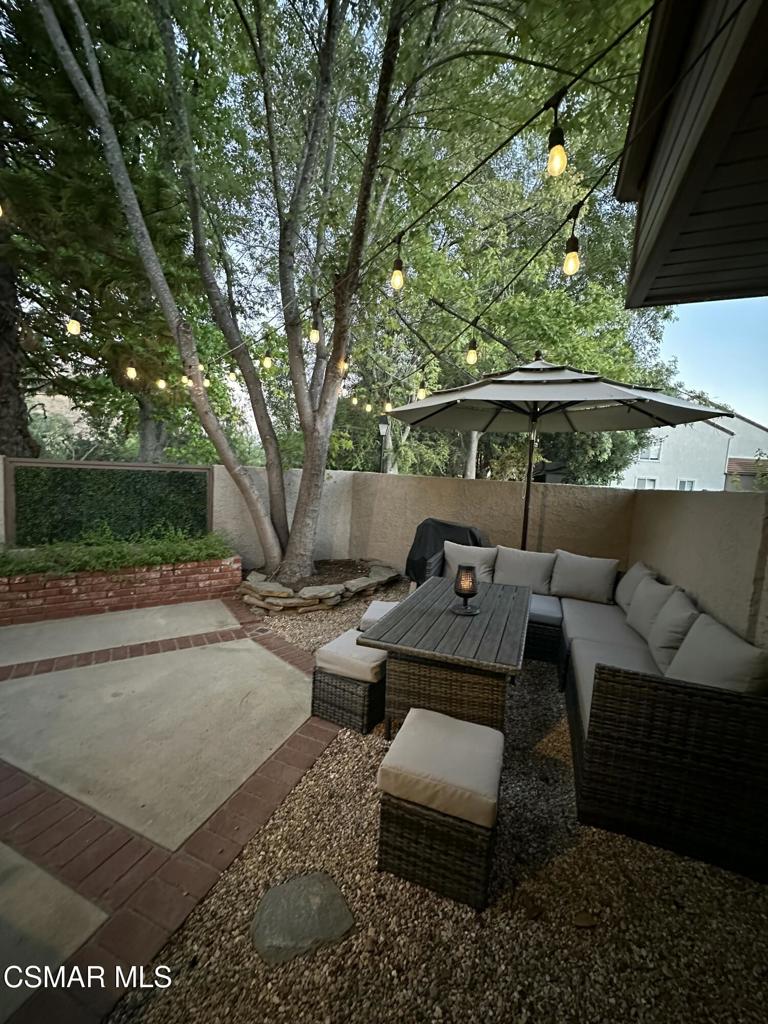 Perched at the top of Hidden Canyon, this beautifully upgraded end-unit townhome offers sweeping hillside views, premium privacy, and modern sophistication in the heart of Westlake Village. Step inside to a bright, open layout featuring wood-like flooring, a cozy fireplace, and effortless indoor-outdoor flow. The remodeled kitchen is sleek and functional with quartz countertops, updated cabinetry, stainless steel appliances-including a brand new microwave (2025)-and abundant storage. Upstairs, you'll find three spacious bedrooms including a serene primary suite with an updated vanity featuring marble countertops (2023), generous closet space, and peaceful greenbelt views. The secondary bathroom was also renovated in 2023 with new flooring and a marble countertop vanity, offering a fresh, luxurious feel. All closets throughout the home were customized in 2023 for enhanced organization and style. Additional updates include a new A/C condenser (2024) for efficient year-round comfort. Enjoy a private outdoor patio perfect for relaxing and entertaining, and direct access to a two-car attached garage and laundry. Community highlights include multiple pools and spas, lush greenbelts, scenic walking paths, and ample guest parking. HOA covers landscape, exterior maintenance, parks and more. Located in one of Westlake Village's most desirable communities and at the highest elevation in Hidden Canyon, this move-in ready home offers the perfect balance of comfort, lifestyle, and design.
