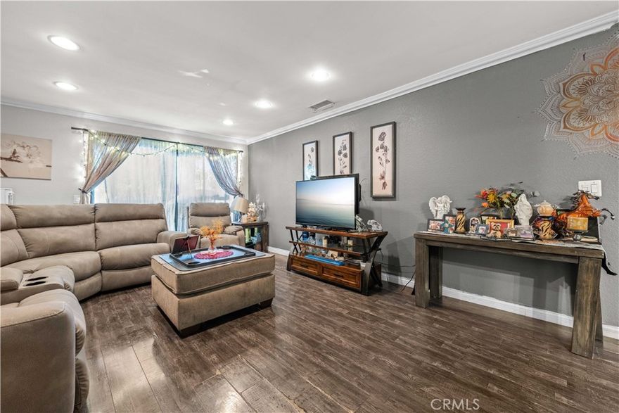 Welcome to this stunning 2-bedroom, 1-bath condo at 12386 Rock Springs Ct #52, Garden Grove, CA 92843, nestled in the serene Les Jardins gated community. This 948 sq ft home, built in 1983, boasts a modern kitchen with sleek appliances, granite countertops, and ample cabinetry, perfect for culinary enthusiasts. The open living area features cozy living room and elegant hardwood floors throughout. Enjoy a formal dining space, in-unit laundry hookups, and a 2-car enclosed garage. The community offers beautiful grounds, a gated pool, and lakes, with easy freeway access and proximity to local schools. A tranquil retreat not to be missed!
