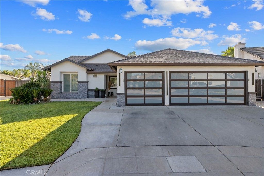Welcome to your dream, pool home in the heart of Northeast Fresno! This stunning renovated custom home offers modern elegance and timeless comfort. Step inside to discover brand-new flooring, an electric fireplace and an updated kitchen. Highlights of the kitchen include: new quartz countertops, complemented by new Miele's appliances including, stove, convection oven, convection microwave/oven and dishwasher that make the kitchen a chef's delight. Every detail has been thoughtfully updated to provide a fresh, contemporary feel with large custom restrooms. Situated on an oversized lot, this home offers ample outdoor space with a new back patio, hot tub and a pool for entertaining. Located in a prime Northeast Fresno neighborhood, you'll enjoy the perfect blend of tranquility and convenience, with top-rated Clovis Unified Schools too much to list must see!!!.