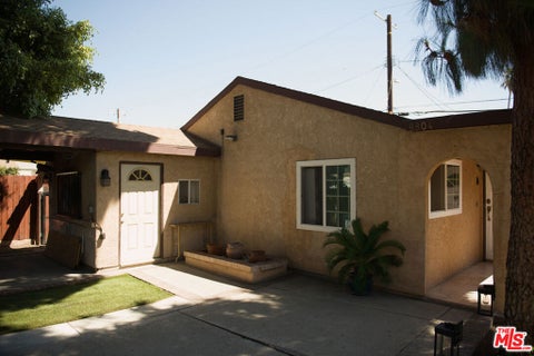 Photo of 8804 Ilex Avenue, Los Angeles, CA 91352 (MLS # 26872485)