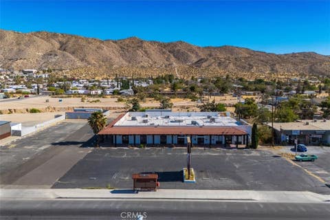 Photo of 56300 Twentynine Palms Highway, Yucca Valley, CA 92284 (MLS # JT26145061)