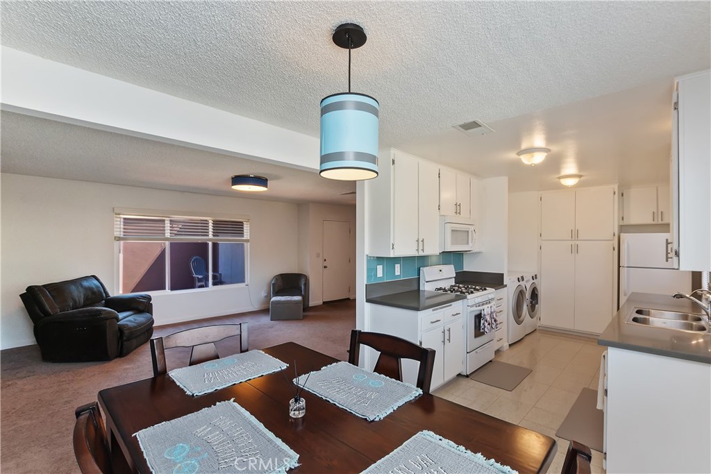 Impeccably clean and maintained condominium in the heart of beautiful Yucaipa!! This spacious 2 bedroom condo would be a wonderful starter home or an opportunity to downsize. Recent updates include the AC Unit, Water Heater, Water Softener, Garbage Disposal, Windows and Blinds, interior paint, and a fire wall installed in the attic along with insulation. Primary bedroom has the luxury of a big walk in closet! The HOA maintains roof and fencing and waste disposal is included in property taxes. Enjoy the convenience of having your own garage and a private courtyard. Located just minutes from Downtown Yucaipa, Flag Hill Park and Yucaipa Regional Park.