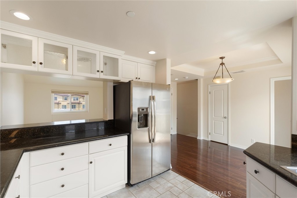 Bright and spacious Manhattan Beach townhome for lease! This updated multi-level unit offers coastal living with an open-concept main floor featuring a large living area with a fireplace, carpeted flooring, and a small private balcony off the dining area for enjoying ocean breezes. Hardwood floors extend throughout the rest of the home, creating a warm and cohesive feel. The kitchen includes newer appliances, including a brand-new oven, ample cabinetry, and a breakfast bar for casual dining.
Upstairs, the bedrooms feature vaulted ceilings and generous closet space. The primary suite includes an en-suite bathroom with a shower. Additional features include a newer washer and dryer in the attached garage, central heating, and a spacious two-car garage with direct access and extra storage.
Located west of Aviation Blvd, this townhome offers convenient access to the beach, shopping, dining, schools, and freeways.