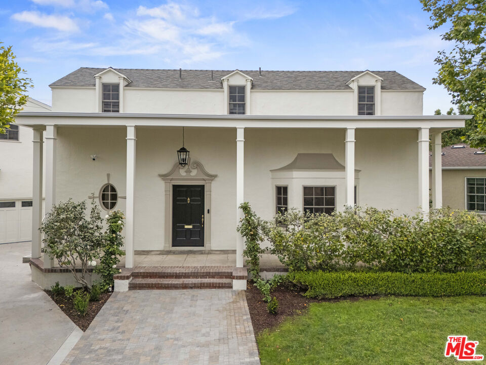 Tucked into one of Cheviot Hills' most desirable pockets, this fully renovated 1936 Colonial Revival blends timeless charm with modern convenience. The main residence offers approx. 3,000 sq ft, featuring 4 bedrooms, 2.5 bathrooms, and beautifully preserved architectural detailss-- arched doorways, period millwork, and rich hardwood floors paired with all-new systems throughout. An attached Junior ADU (JADU) with a private entrance, 1 bed/1 bath, separate mailing address, and its own electrical meter provides an ideal space for guests, extended family, or a home office. Available separately for $3,200/month. Once home to the Dr. Doolittle author, the residence exudes creative energy and natural light. The original Sunset pool is now surrounded by newly installed French Provencal landscaping, perfect for entertaining. A finished 2-car garage with EV charger completes the offering.Located in the coveted Castle Heights School District, just minutes from Century City and Beverly Hills, this is a rare chance to rent a turnkey historic home in an A+ location.
