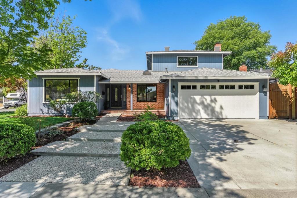 Occupying a prime corner lot near two expansive parks, this exceptional 4BD/3BA San Jose home situated in the highly sought after neighborhood of Thousand Oaks, blends tranquil living with unbeatable convenience and easy freeway access. Inside, a bright, functional layout welcomes you with a versatile front room perfect for an office or lounge, and a dedicated dining area leading into a spacious kitchen with stainless steel appliances, gas cooktop, island, and breakfast bar. A striking backlit onyx fireplace adds a luxe touch, echoed in the bathroom design. The open living area flows to a serene backyard through sliding glass doors, ideal for indoor-outdoor living. The main-level primary suite features a large ensuite, generous closet, and private backyard access. Upstairs, two light-filled bedrooms and a full bath offer flexible space for guests, hobbies, or remote work. With an airy layout and strong indoor-outdoor connection, this home supports both relaxed everyday living and lively gatherings.