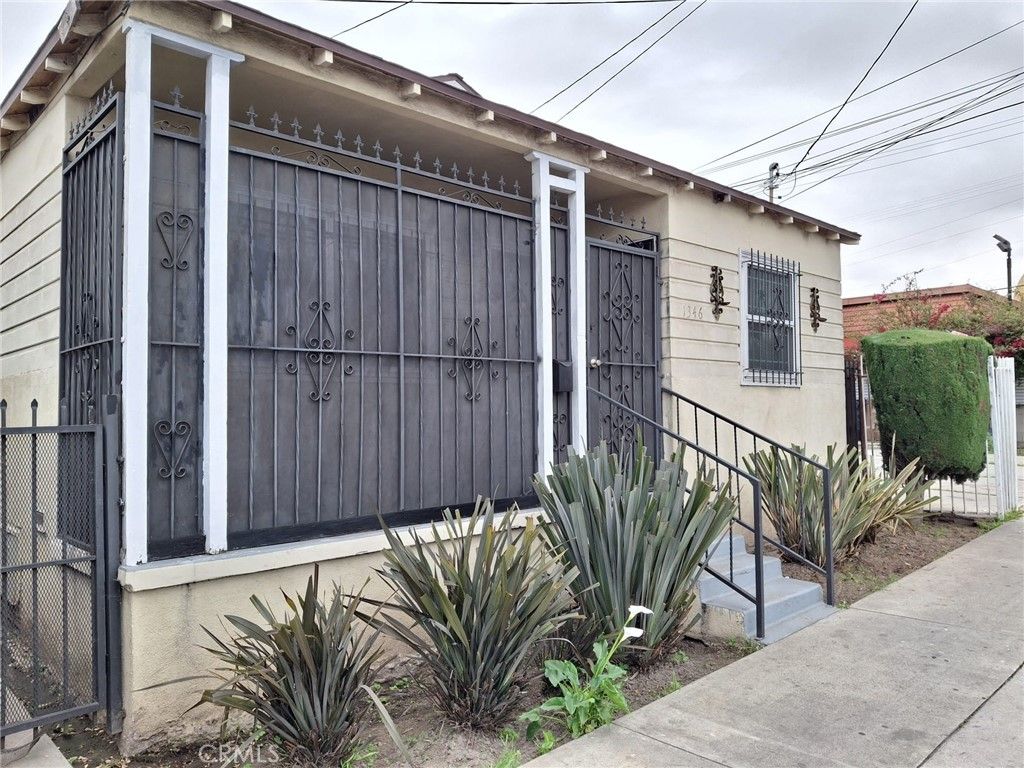 Photo of 1346 W Century Boulevard, Los Angeles, CA 90044 (MLS # IV25090314)