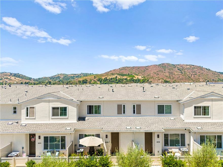 Welcome to 35115 Rangpur Lane! A modern 2-bedroom, 2.5-bath condo built in 2022, located in Fallbrook’s sought-after Citro community. Designed with energy efficiency and comfort in mind, this home includes OWNED Solar, a tankless water heater, smart thermostats, and an energy-efficient HVAC system. Inside, the open-concept layout is filled with natural light and flows into a sleek, open layout kitchen with with ample cabinet space. Upstairs, features both bedrooms, including a spacious primary suite with dual sinks and a walk-in shower. Citro offers over 200 acres of open space, scenic trails, a community garden, parks, and resort-style amenities including a pool, spa, and outdoor grill area. Tucked in a prime location near shopping, hiking, and major freeways—this home blends modern style, smart tech, and convenience in one perfect package.