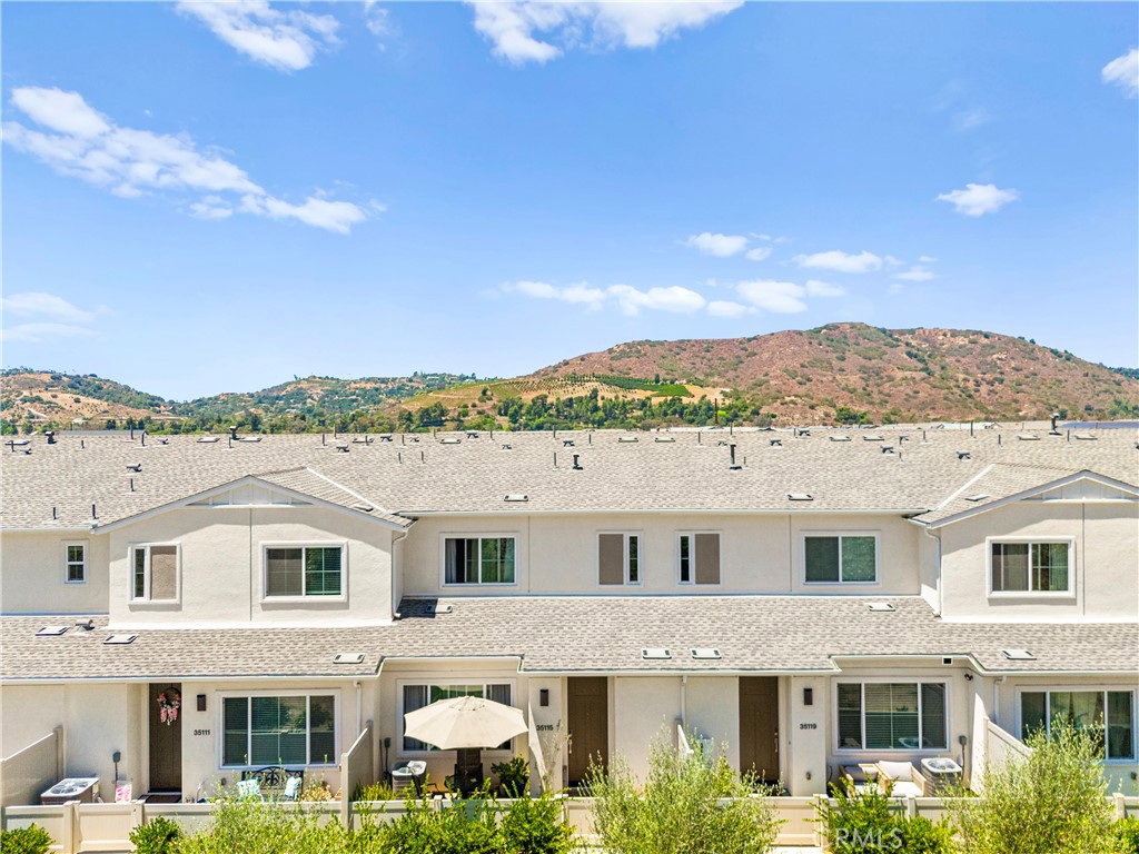 Welcome to 35115 Rangpur Lane! A modern 2-bedroom, 2.5-bath condo built in 2022, located in Fallbrook’s sought-after Citro community. Designed with energy efficiency and comfort in mind, this home includes OWNED Solar, a tankless water heater, smart thermostats, and an energy-efficient HVAC system. Inside, the open-concept layout is filled with natural light and flows into a sleek, open layout kitchen with with ample cabinet space. Upstairs, features both bedrooms, including a spacious primary suite with dual sinks and a walk-in shower. Citro offers over 200 acres of open space, scenic trails, a community garden, parks, and resort-style amenities including a pool, spa, and outdoor grill area. Tucked in a prime location near shopping, hiking, and major freeways—this home blends modern style, smart tech, and convenience in one perfect package.