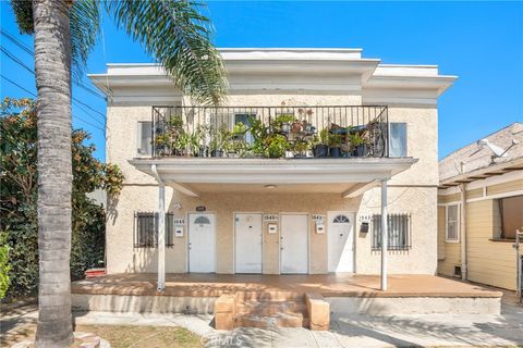 Photo of 1543 W 22nd Place Pl, Los Angeles, CA 90007 (MLS # PW26081006)
