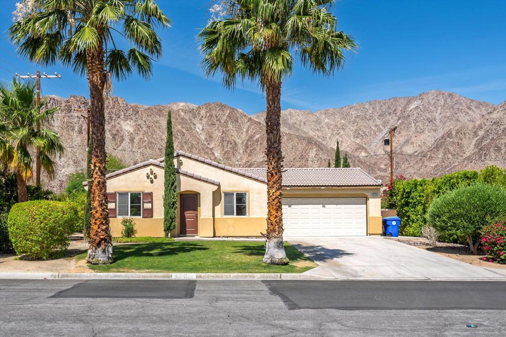 Charming Desert Retreat in La Quinta Cove! Welcome to a beautifully maintained 3-bedroom, 2-bathroom home nestled in the highly desirable La Quinta Cove. This home is move in ready. It is newer than most, and shows beautifully. All kitchen appliances are here, along with a washer and dryer. The attached garage has a Tesla charger. Located on a corner, it has a larger lot than most. Surrounded by breathtaking mountain views and just minutes from Old Town La Quinta, this inviting residence offers the perfect blend of comfort, convenience, and desert charm.Step inside to discover a freshly painted, bright and open floor plan featuring vaulted ceilings, luxury vinyl plank throughout, and abundant natural light. The spacious living room flows seamlessly into the dining area and kitchen, complete with granite countertops, stainless steel appliances, and ample cabinetry.The primary suite features direct access to the backyard, a walk-in closet, and an en-suite bathroom with a walk-in shower. Two additional guest bedrooms and a second full bath provide plenty of space for family, guests, or a home office.Enjoy indoor-outdoor living with a fully enclosed backyard, ideal for relaxing under the stars or entertaining friends. The landscaping, fruit trees, and covered patio complete the outdoor experience.Additional highlights include a two-car attached garage, Tesla charger, washer/dryer inside the home, and central air conditioning. Located close to hiking trails, golf courses, restaurants, and top-rated schools.Available for long-term lease. Pets considered upon approval. Don't miss this opportunity to live in one of La Quinta's most charming neighborhoods!$3100 per month, 1 year lease. The owner pays for landscaping. Utility costs are paid by the tenant.